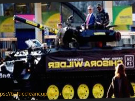 Derek Chisora’s Grand Entrance: Rolls Up in an Army Tank with Nigel Farage at Wilder Press Conference