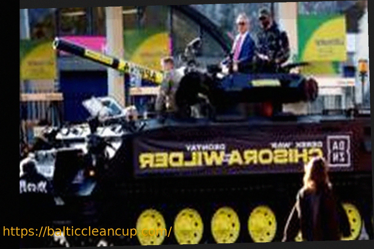 Preview Derek Chisora’s Grand Entrance: Rolls Up in an Army Tank with Nigel Farage at Wilder Press Conference